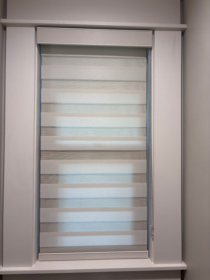 White custom zebra roller shades professionally installed in a North Pasadena home.