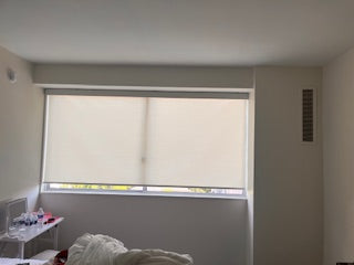 Custom light-filtering roller shade providing soft natural light