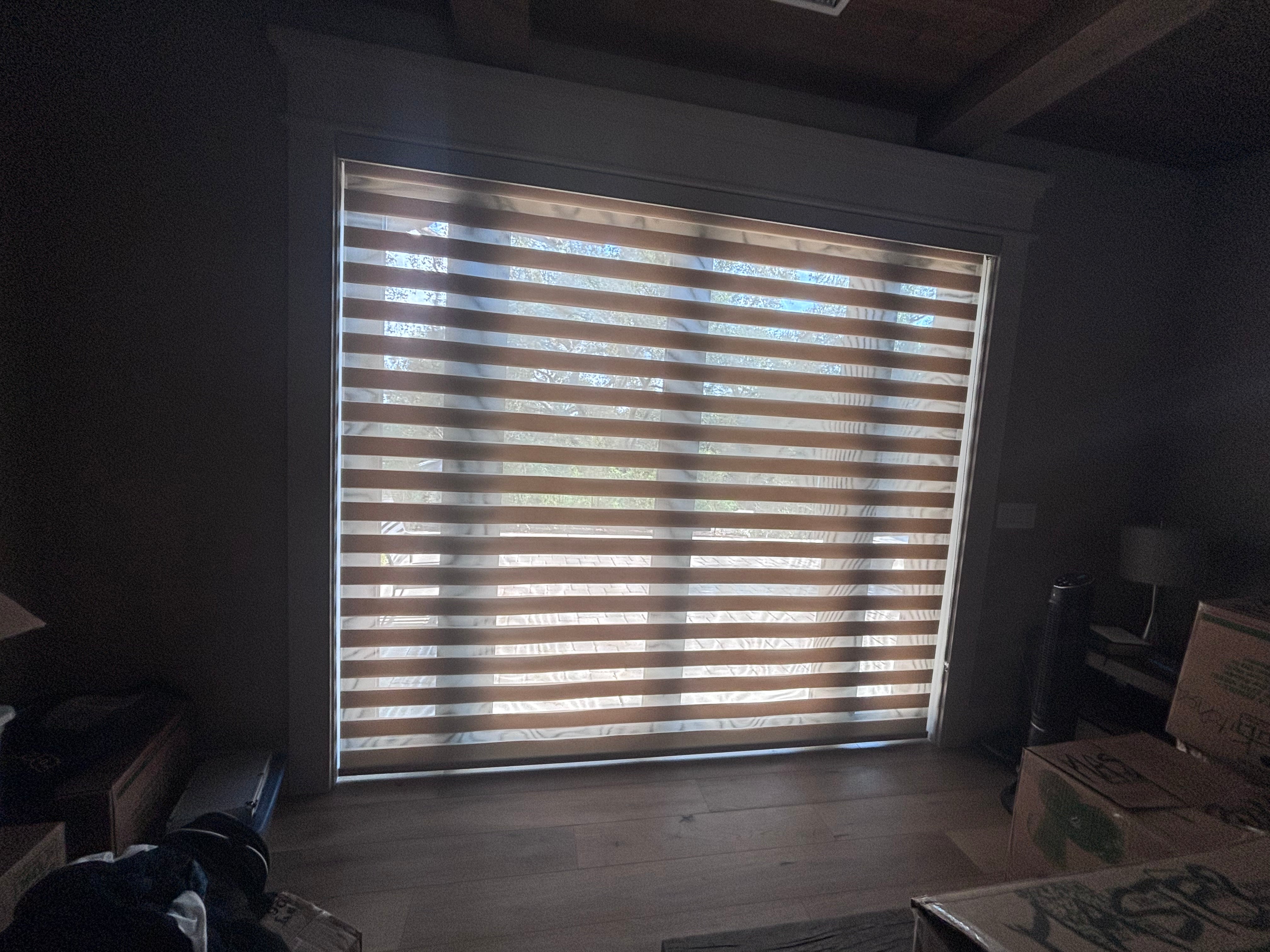 White custom zebra roller shades professionally installed in a North Pasadena home.