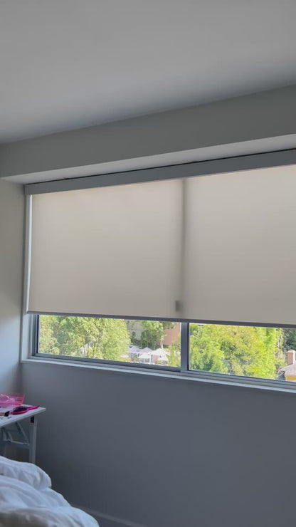 Motorized light-filtering roller shade opening to soften natural light